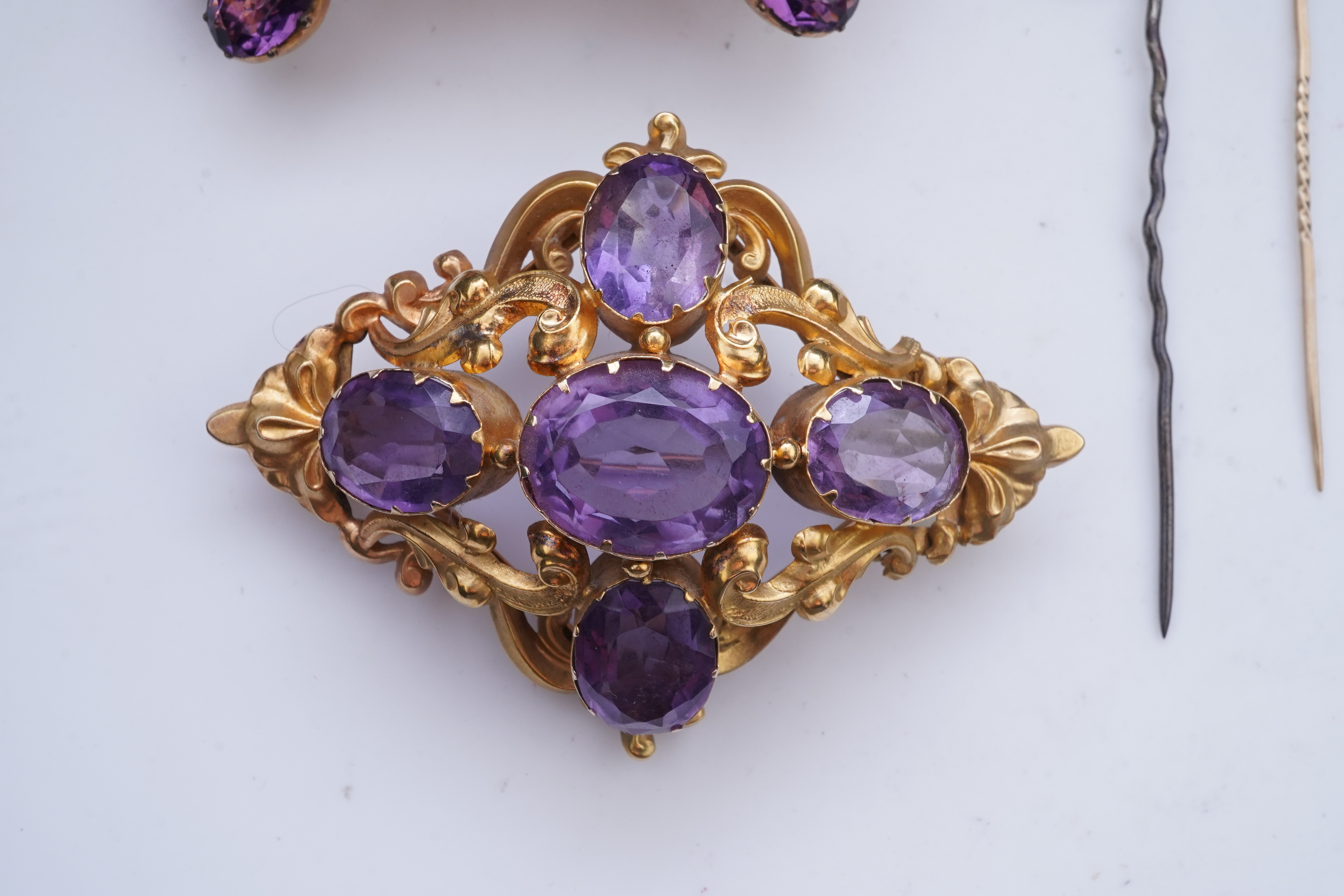 A collection of jewels including a Georgian paste brooch, early 19th century
